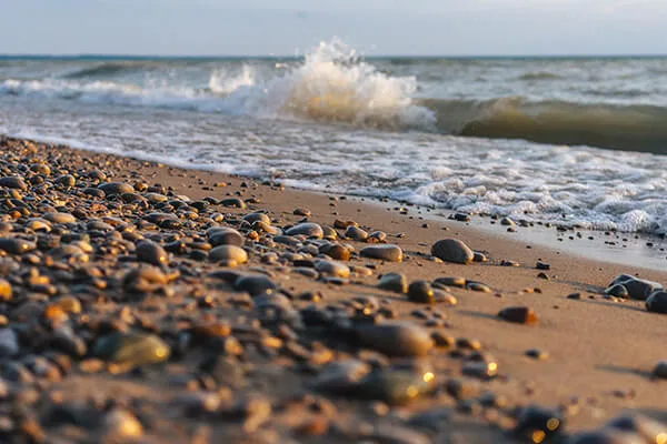 Waves breaking on a pebbly Lake Michigan beach